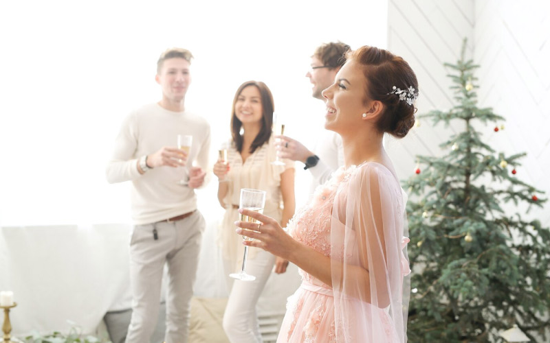 family celebrating with newly engaged woman, affordable coach charter, August 2024, NZ