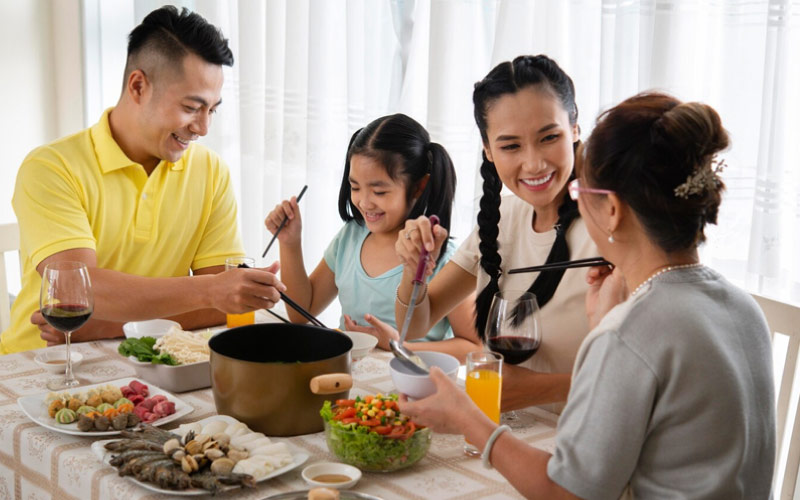 Mum eating brunch with husband and children, Christchurch family trips, January 2025, NZ